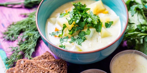 homemade vegetarian soup with potato carrots pepper with dark bread dill wooden background 1