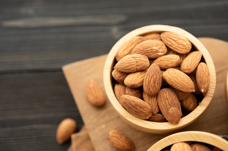 bowl with almond wooden table